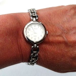 Carriage by Timex watch.